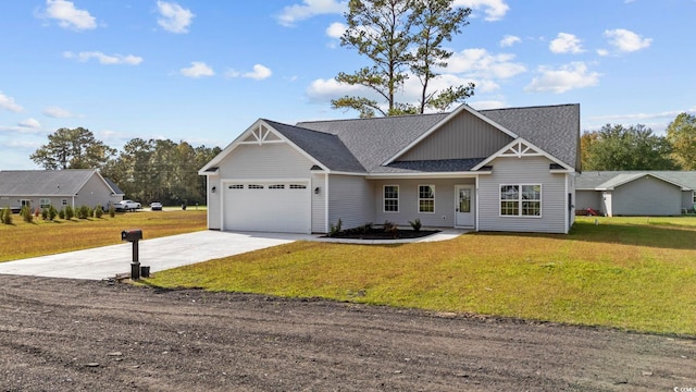 view of front of home with a garage and a front yard