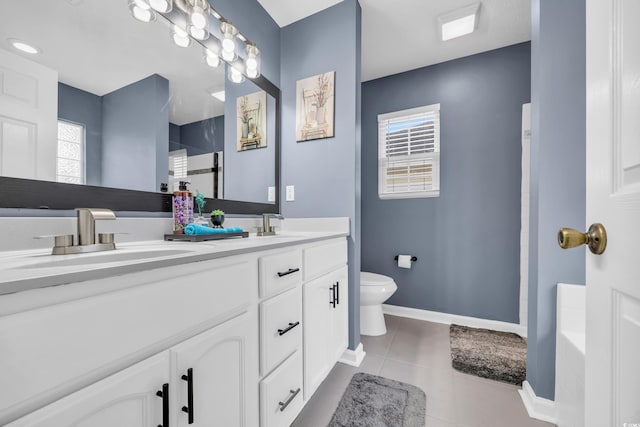 full bathroom featuring tile patterned floors, toilet, vanity, and shower with separate bathtub