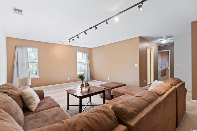 living room featuring a healthy amount of sunlight