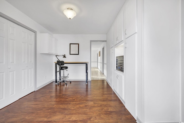 interior space with dark wood-type flooring