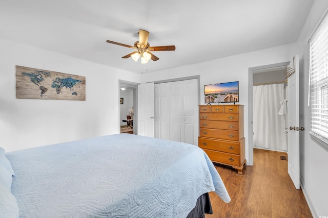 bedroom featuring light hardwood / wood-style flooring, a closet, and ceiling fan