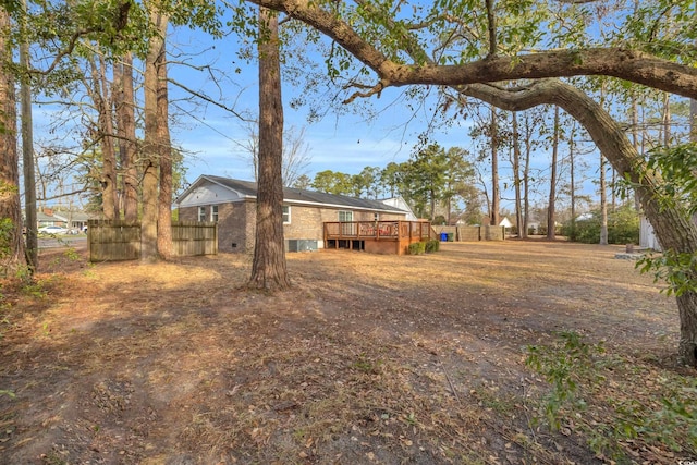 view of yard with a deck