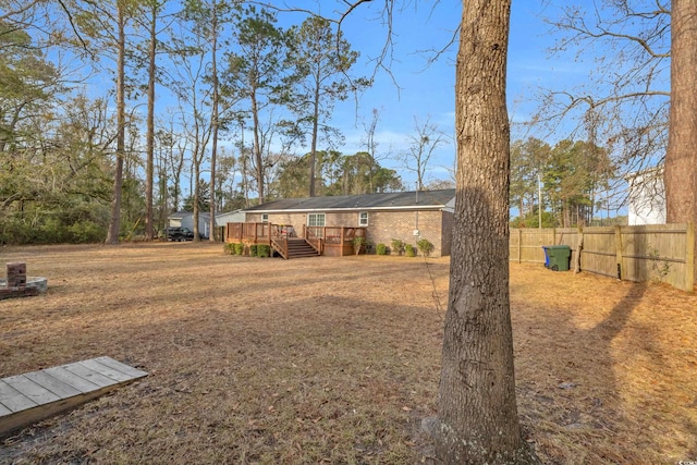 view of yard with a deck