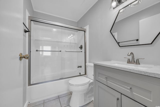 full bathroom with tile patterned flooring, enclosed tub / shower combo, vanity, toilet, and crown molding