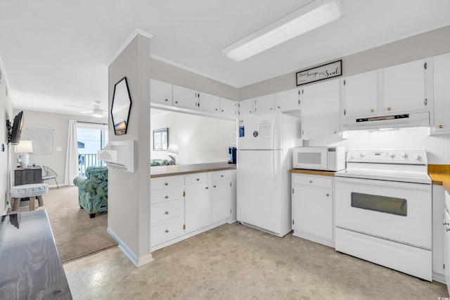 kitchen with ceiling fan, white appliances, and white cabinets