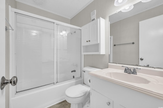 full bathroom featuring toilet, crown molding, a textured ceiling, vanity, and enclosed tub / shower combo