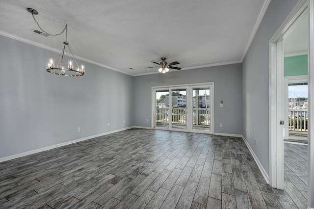 spare room with dark hardwood / wood-style flooring, ceiling fan with notable chandelier, and crown molding