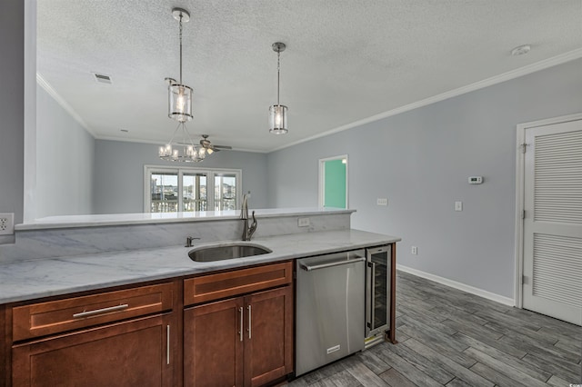 kitchen featuring beverage cooler, dishwasher, sink, and light stone countertops