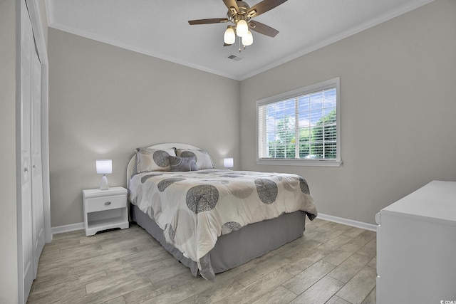 4200 Coquina Harbour Dr Unit H3, Little River, SC 29566 - bedroom with light wood-type flooring, ornamental molding, and a ceiling fan