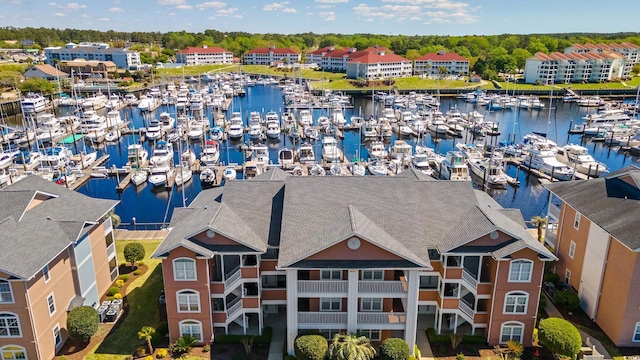 bird's eye view with a water view