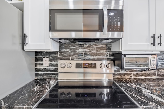4609 Lightkeepers Way Unit 11J, Little River, SC 29566 - kitchen featuring white cabinets, backsplash, appliances with stainless steel finishes, and a toaster