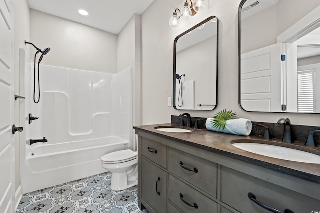 bathroom with visible vents, a sink, shower / bathing tub combination, and double vanity