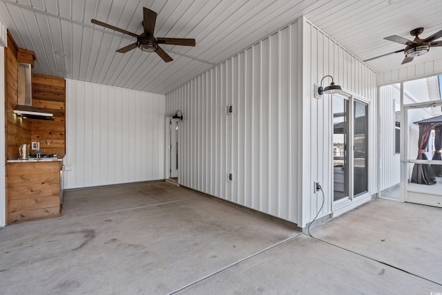 exterior space with a ceiling fan