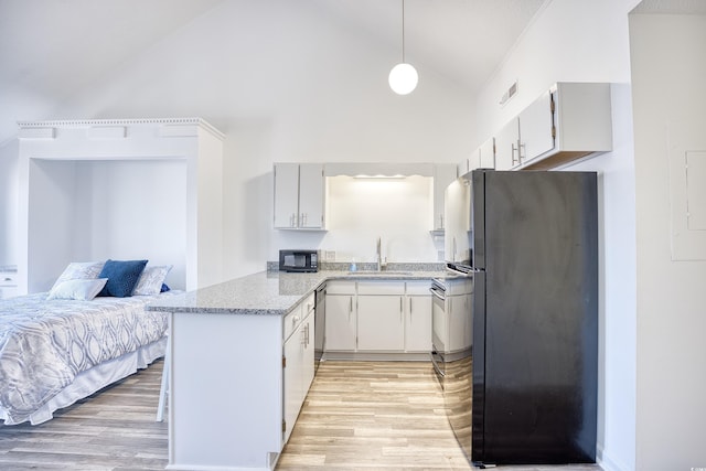 kitchen featuring white cabinetry, sink, light hardwood / wood-style flooring, and black appliances