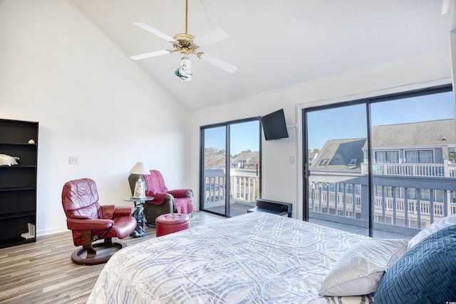 bedroom featuring ceiling fan, high vaulted ceiling, access to exterior, and light hardwood / wood-style floors