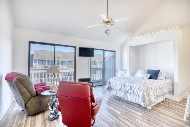 bedroom featuring ceiling fan, lofted ceiling, hardwood / wood-style floors, and access to outside