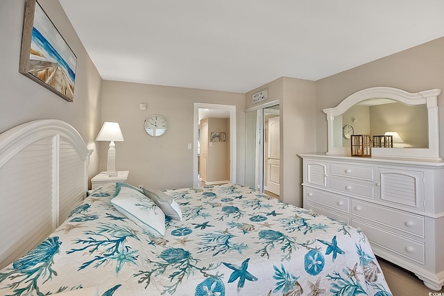 bedroom with hardwood / wood-style flooring