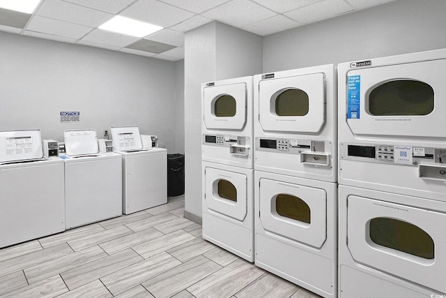 washroom featuring stacked washing maching and dryer and washer and clothes dryer