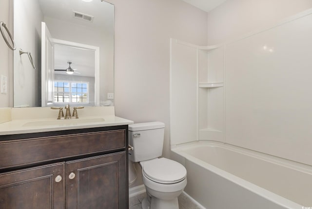 full bathroom featuring vanity,  shower combination, and toilet