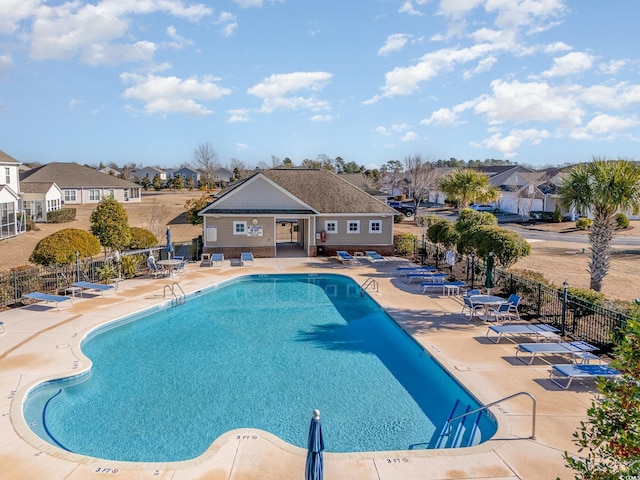 view of pool featuring a patio