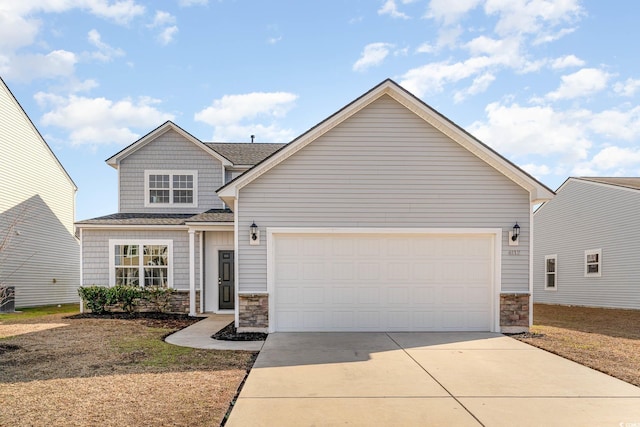 view of front of property with a garage