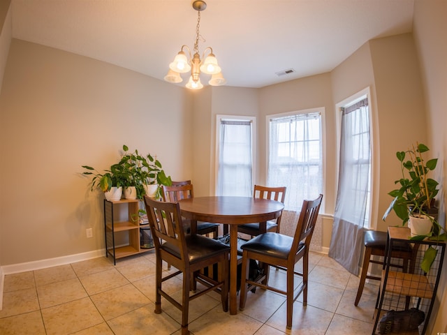 788 Rambler Ct, Myrtle Beach, SC 29588 - dining room featuring light tile patterned flooring and a chandelier