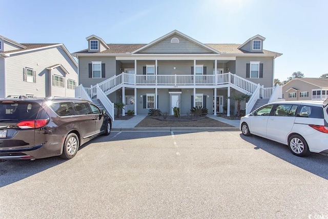 multi unit property featuring a porch