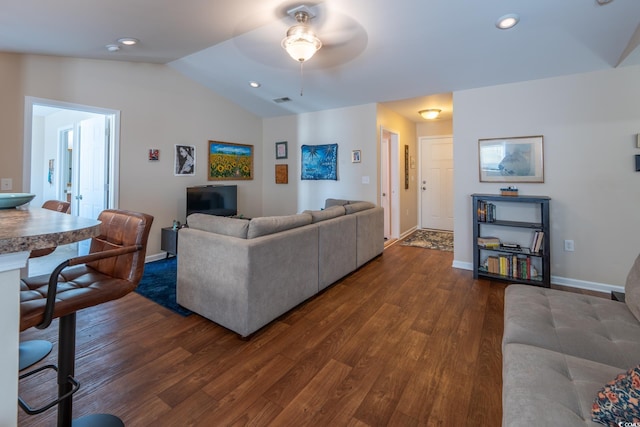 living room with lofted ceiling, recessed lighting, a ceiling fan, baseboards, and dark wood finished floors