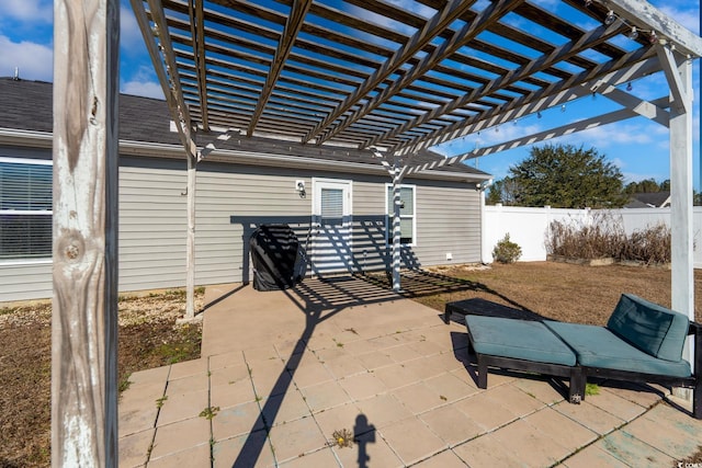 view of patio / terrace with fence and a pergola