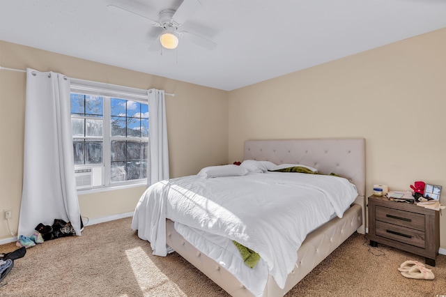 bedroom with light carpet and ceiling fan