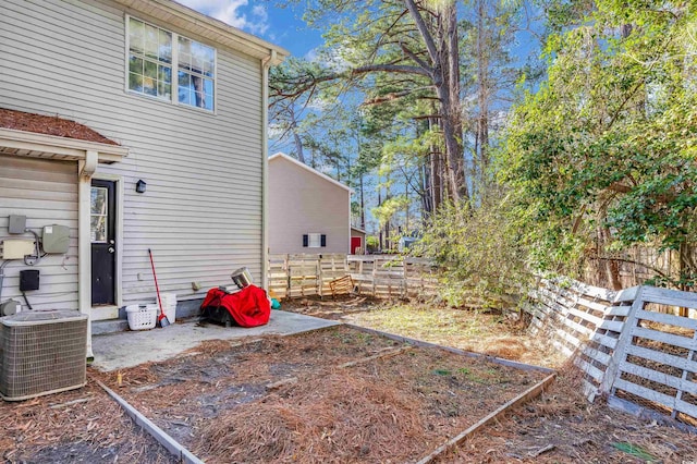 view of yard with central AC unit