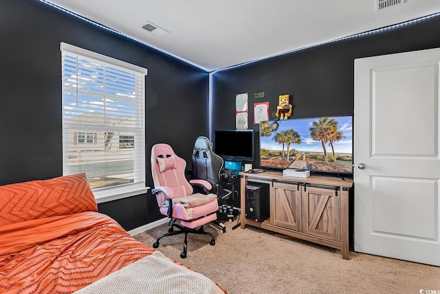 bedroom with light carpet