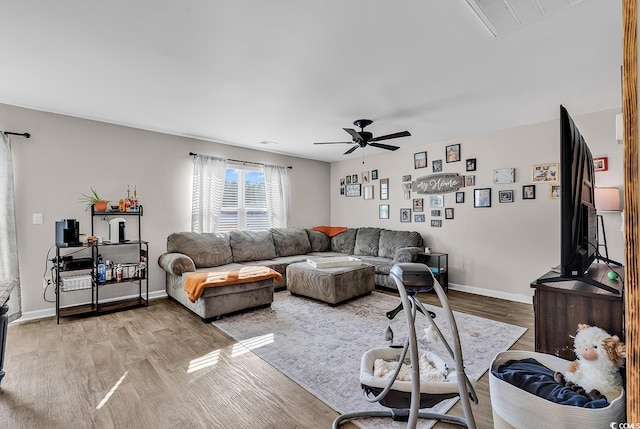 589 Talisman Trl, Longs, SC 29568 - living room with baseboards, ceiling fan, visible vents, and wood finished floors