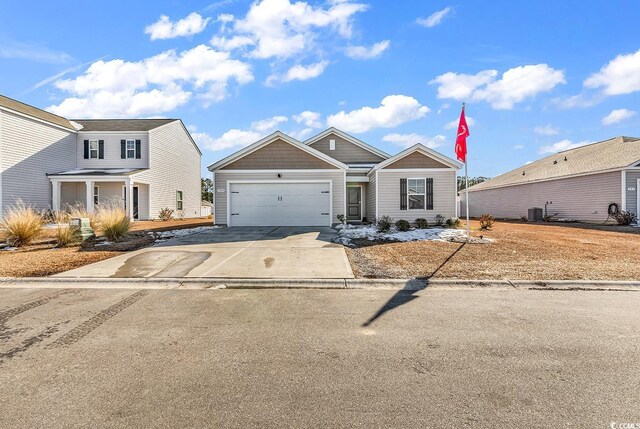 view of front of home with a garage