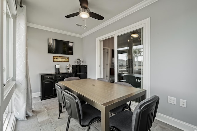 home office featuring ornamental molding and ceiling fan