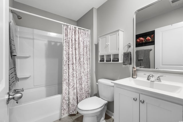 full bathroom featuring vanity, toilet, tile patterned flooring, and shower / tub combo