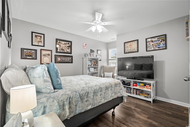 bedroom featuring dark hardwood / wood-style flooring and ceiling fan