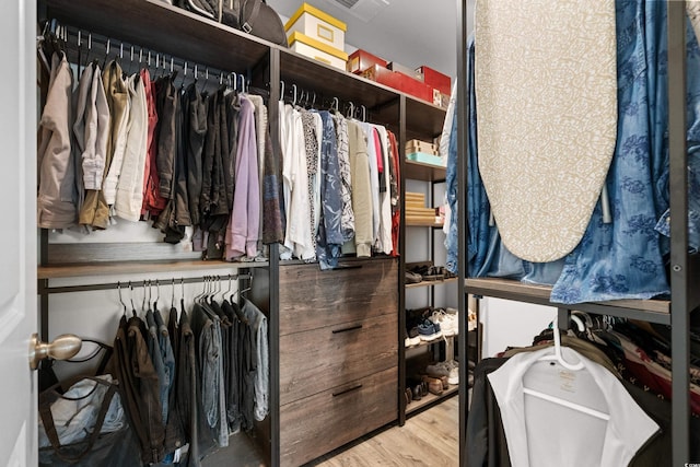 spacious closet featuring light wood-type flooring