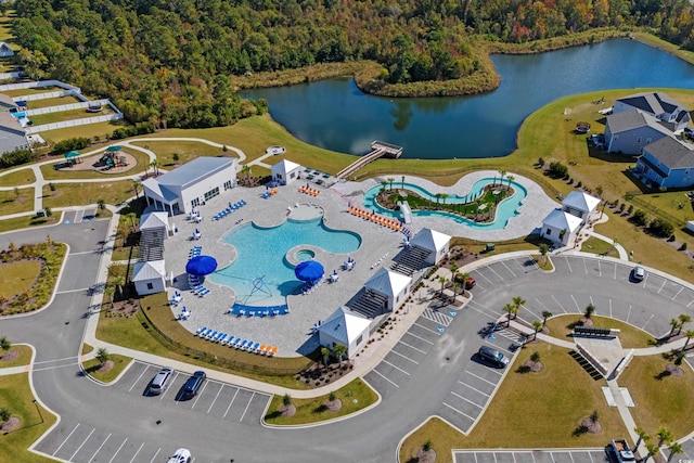 birds eye view of property with a water view