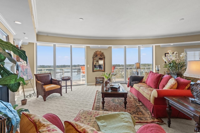 living room featuring ornamental molding and light carpet