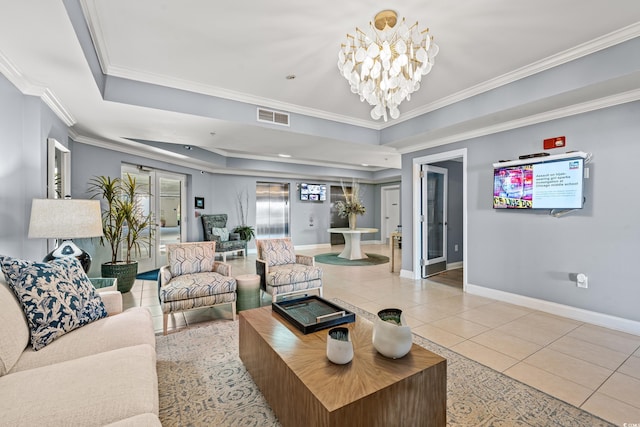 tiled living room with a tray ceiling, crown molding, and a chandelier