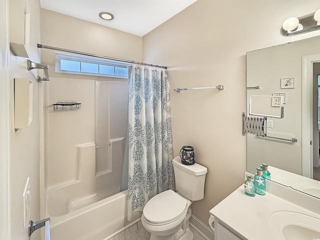 full bathroom with vanity, baseboards, shower / bathtub combination with curtain, and toilet