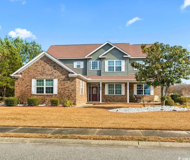 view of front of property featuring a front yard