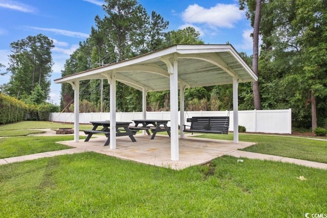 view of home's community featuring a gazebo, a yard, and a patio area