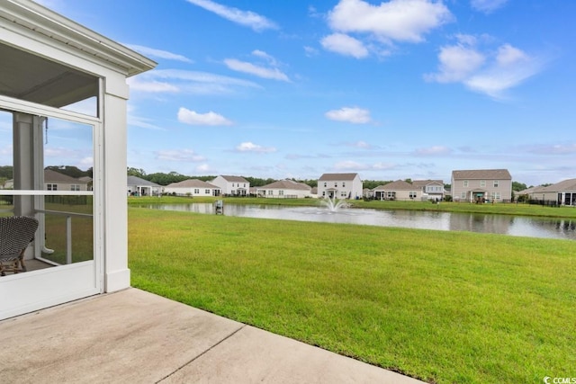 view of yard with a water view