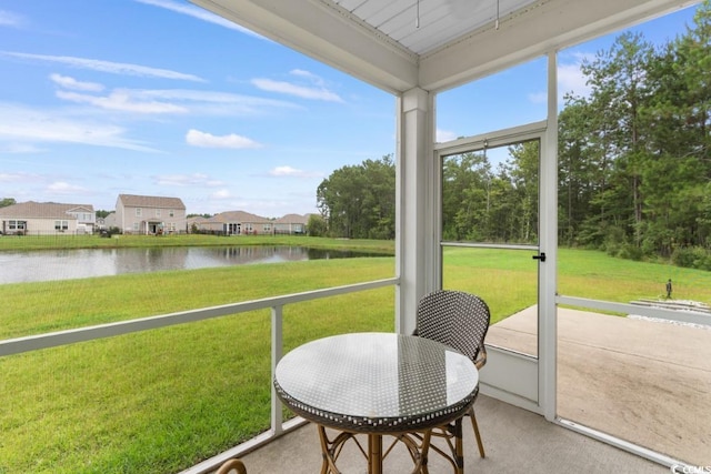 sunroom with a water view