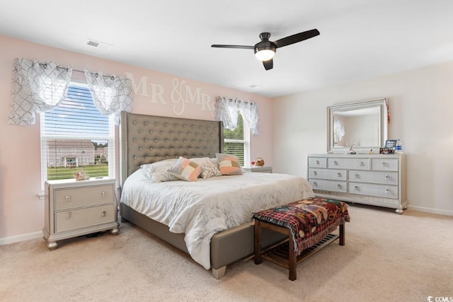 carpeted bedroom with ceiling fan