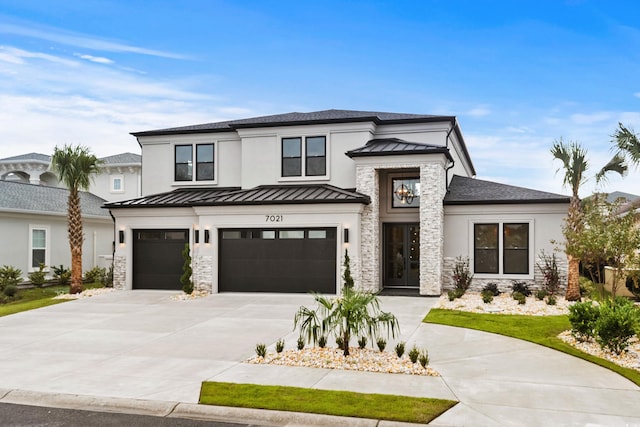 view of front of home featuring a garage