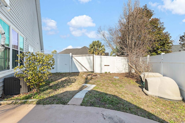 view of yard featuring central AC