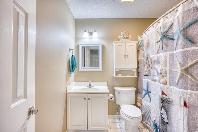 full bath with tile patterned flooring, a textured ceiling, toilet, and vanity